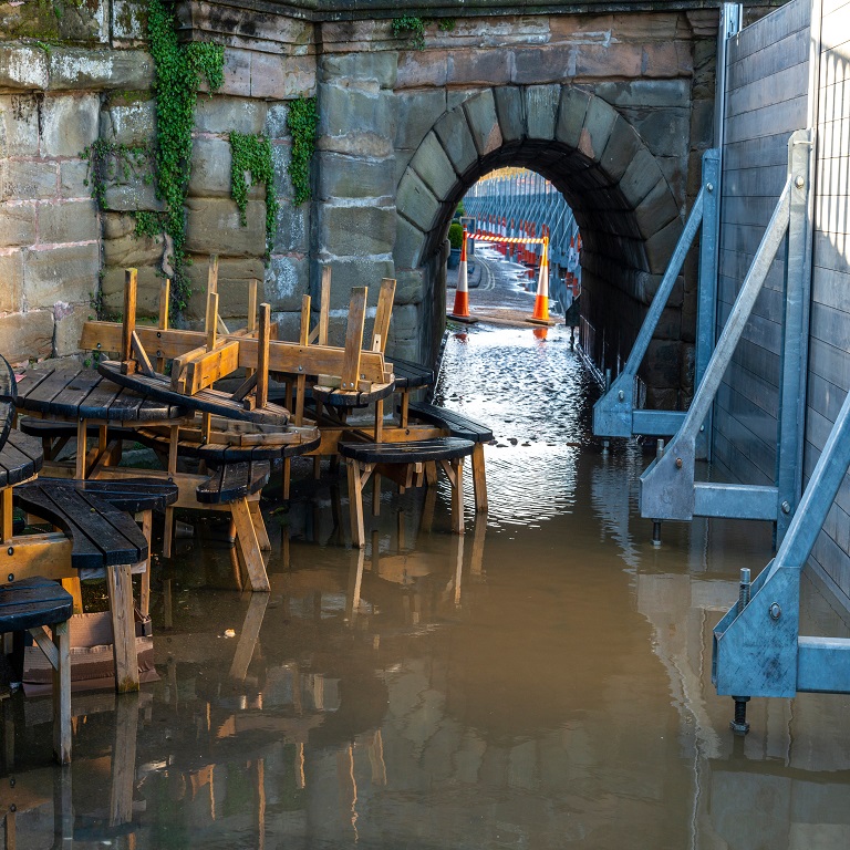Bewdley,Worcestershire,England,UK- February 22 2022: Dangerously high river waters are prevented from overflowing by thr use of flood barriers to protect local residents.